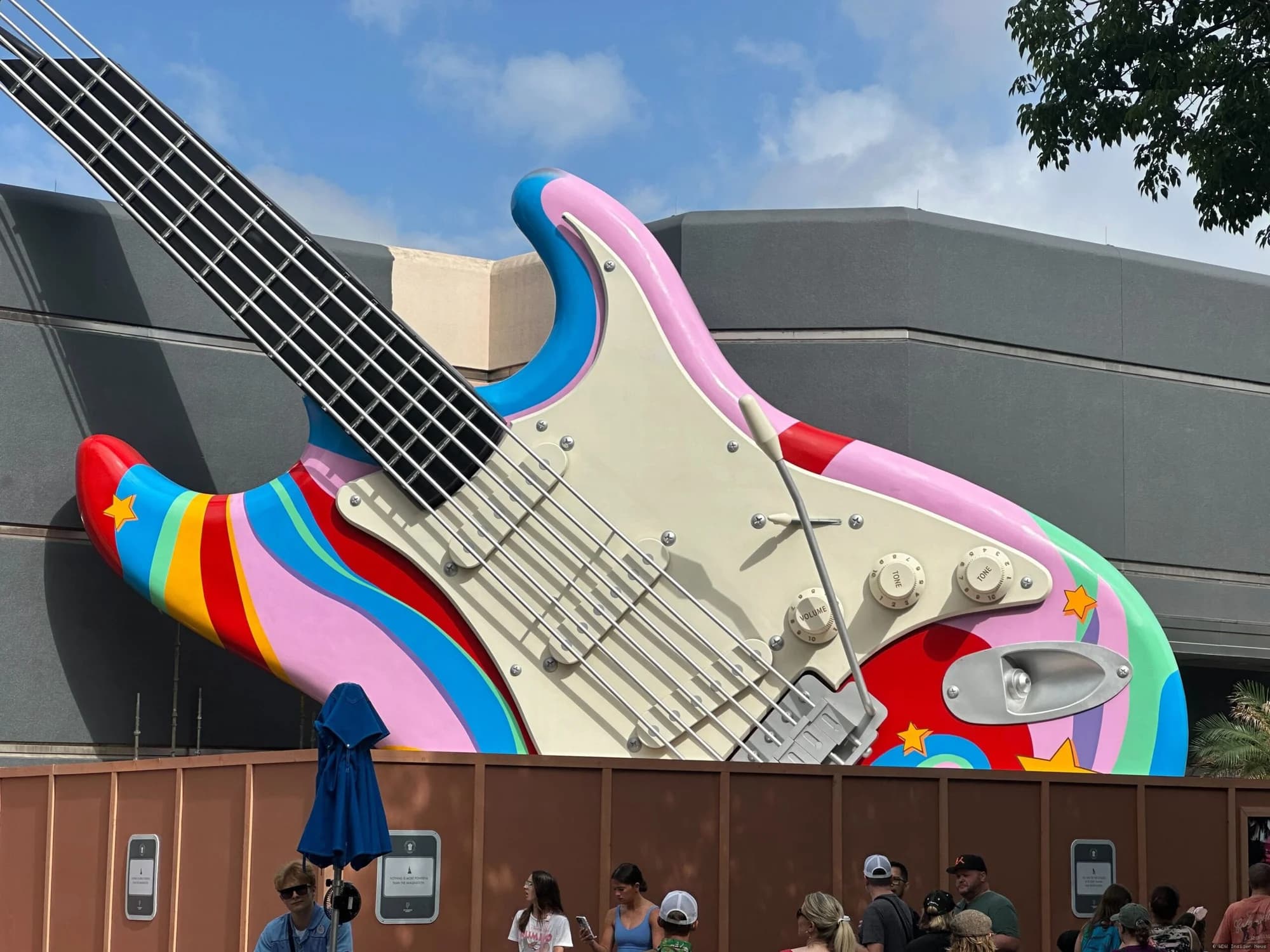 Rock n Roller Coaster Muppets guitar attraction with orange star design visible after scaffolding removal at Walt Disney…