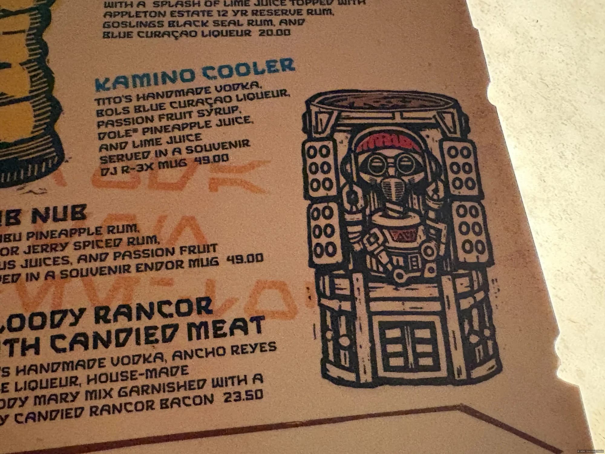 Colourful tiki mug featuring DJ R-3X character design displayed at Oga's Cantina in Star Wars: Galaxy's Edge
