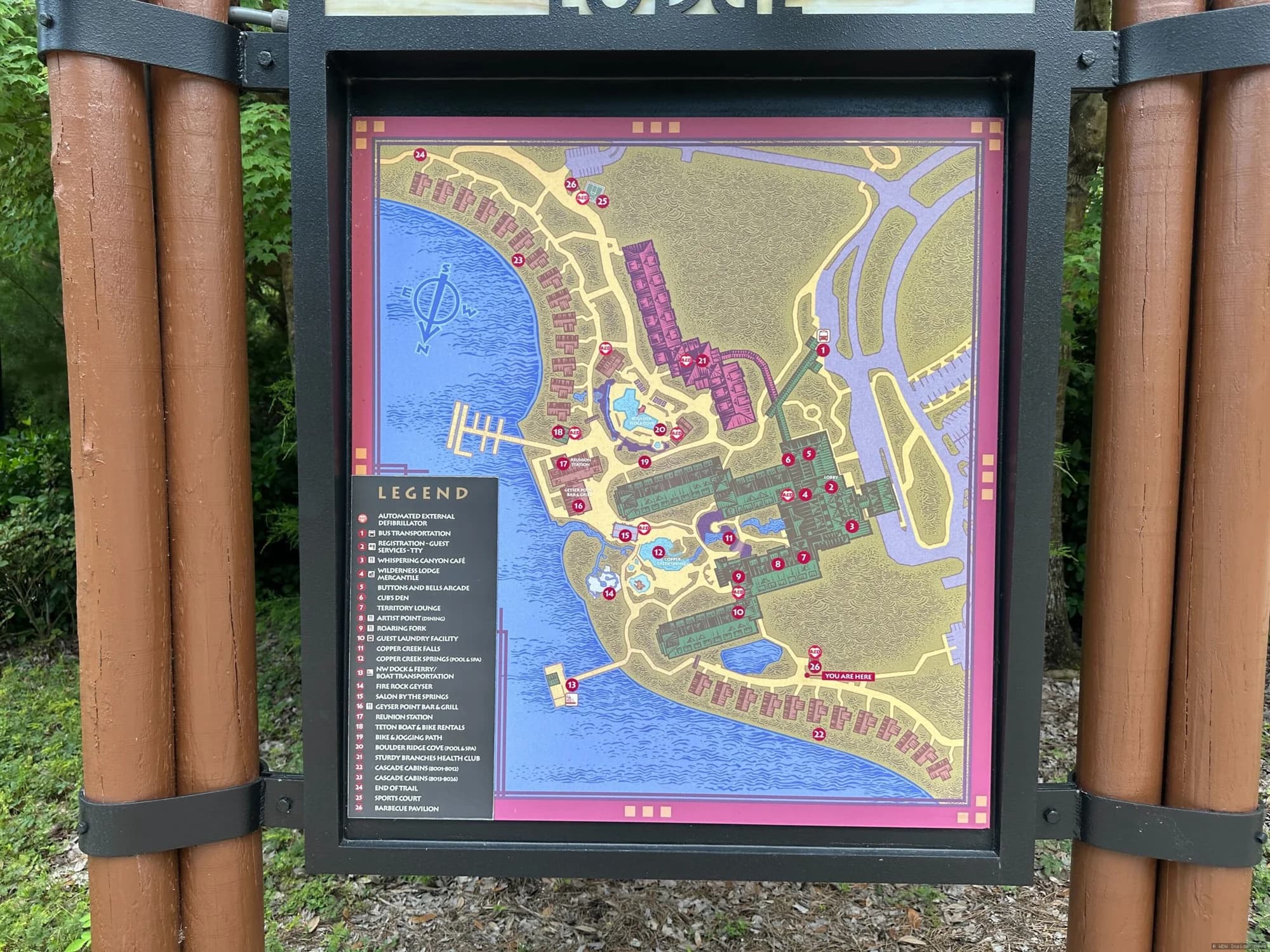Wooden boardwalk pathway at Disney's Wilderness Lodge resort, with construction barriers indicating closure for…