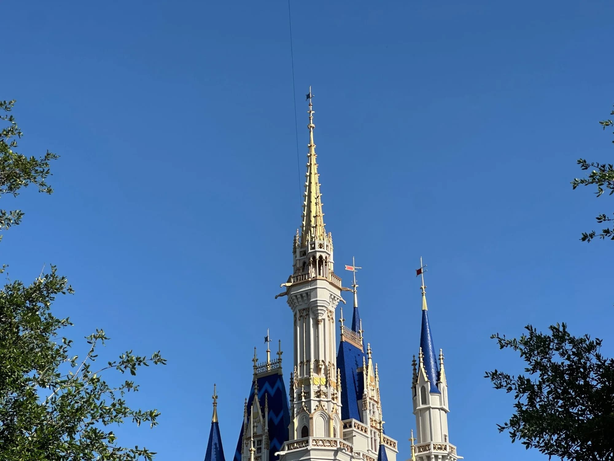 Cinderella Castle Painting Continues on Highest Tower at Magic Kingdom