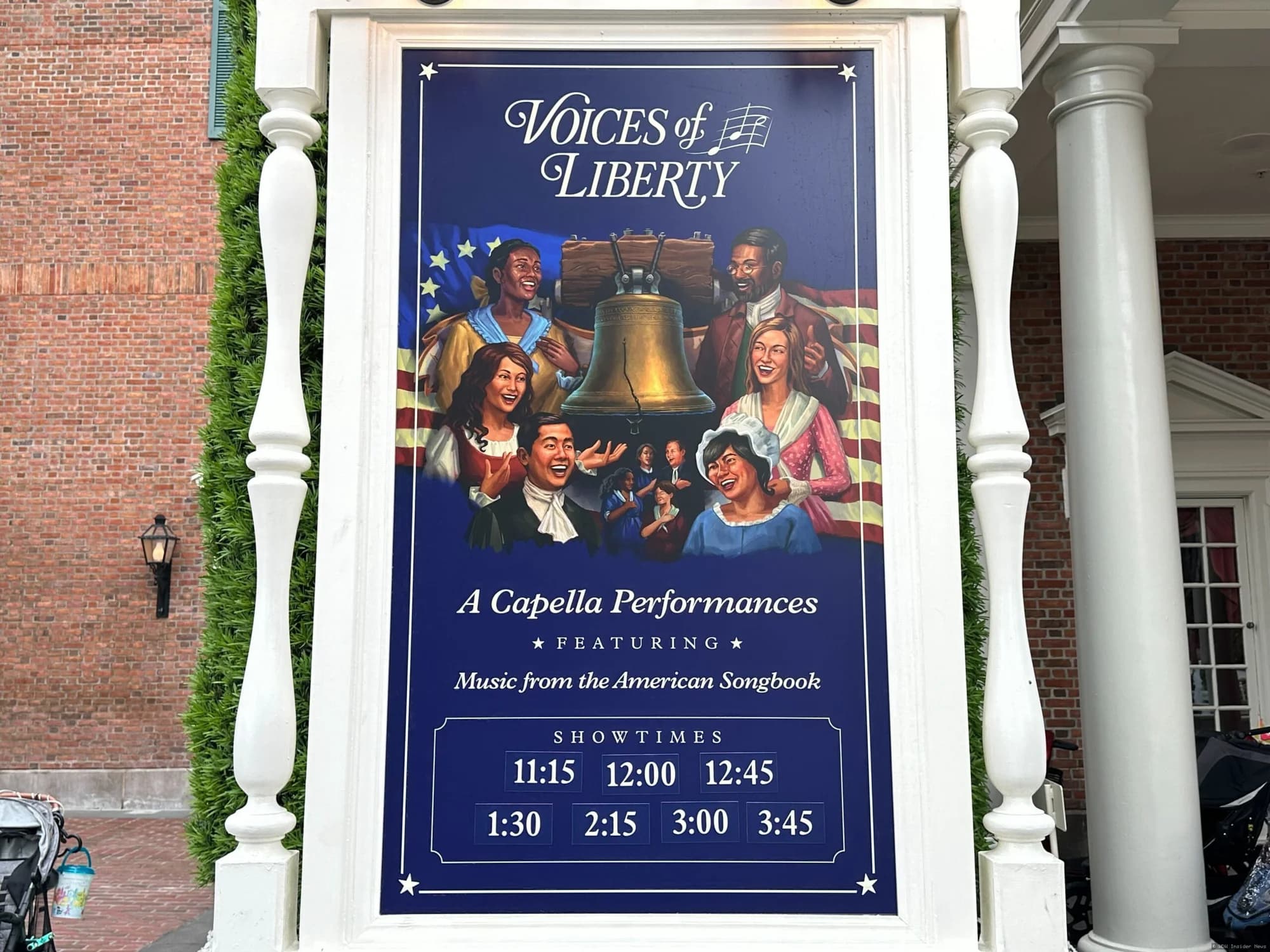 A new illuminated sign displaying "Voices of Liberty" at the entrance to EPCOT's American Adventure pavilion