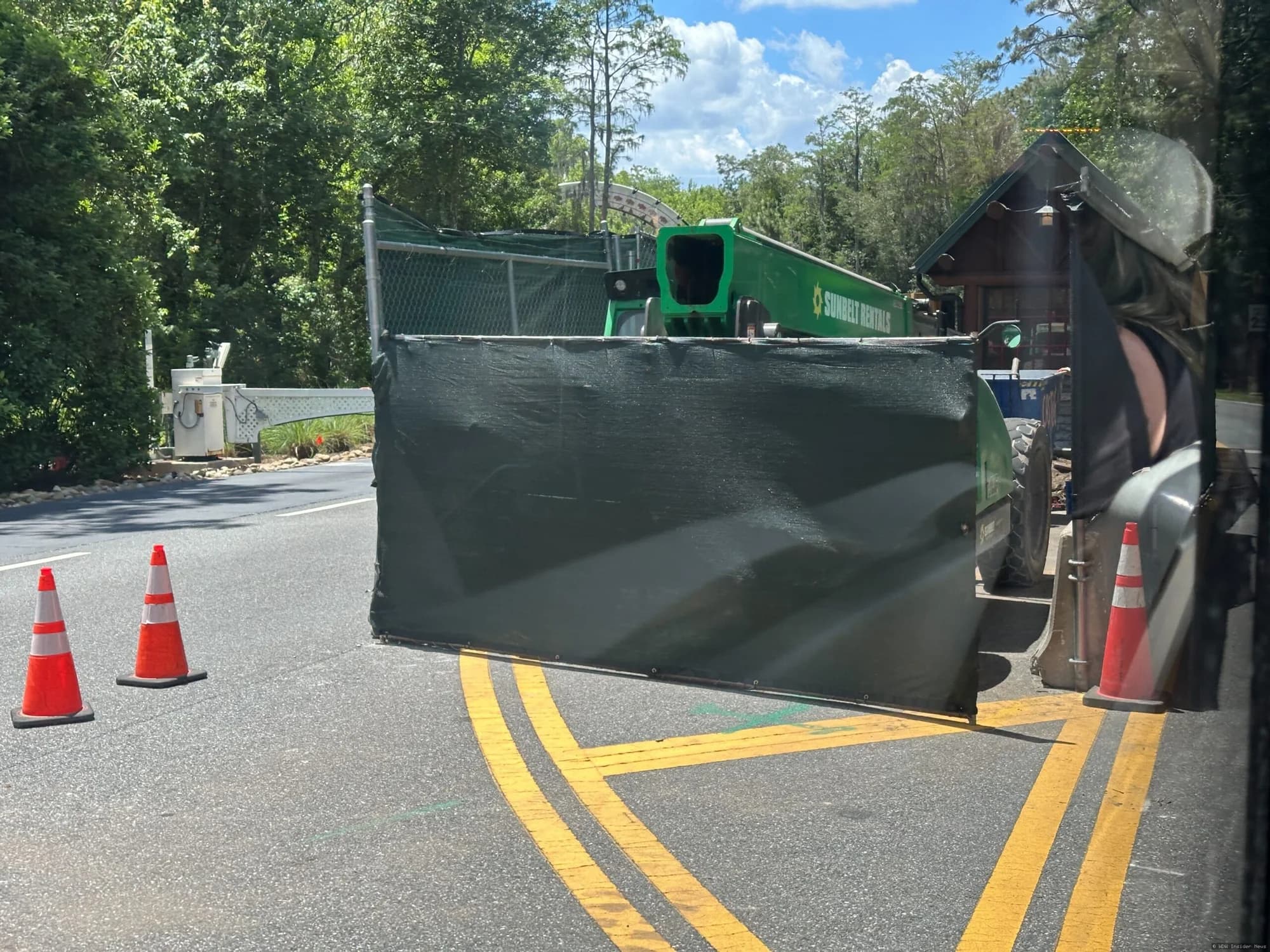 Construction barriers and equipment at Disney's Wilderness Lodge security kiosk and boat dock area