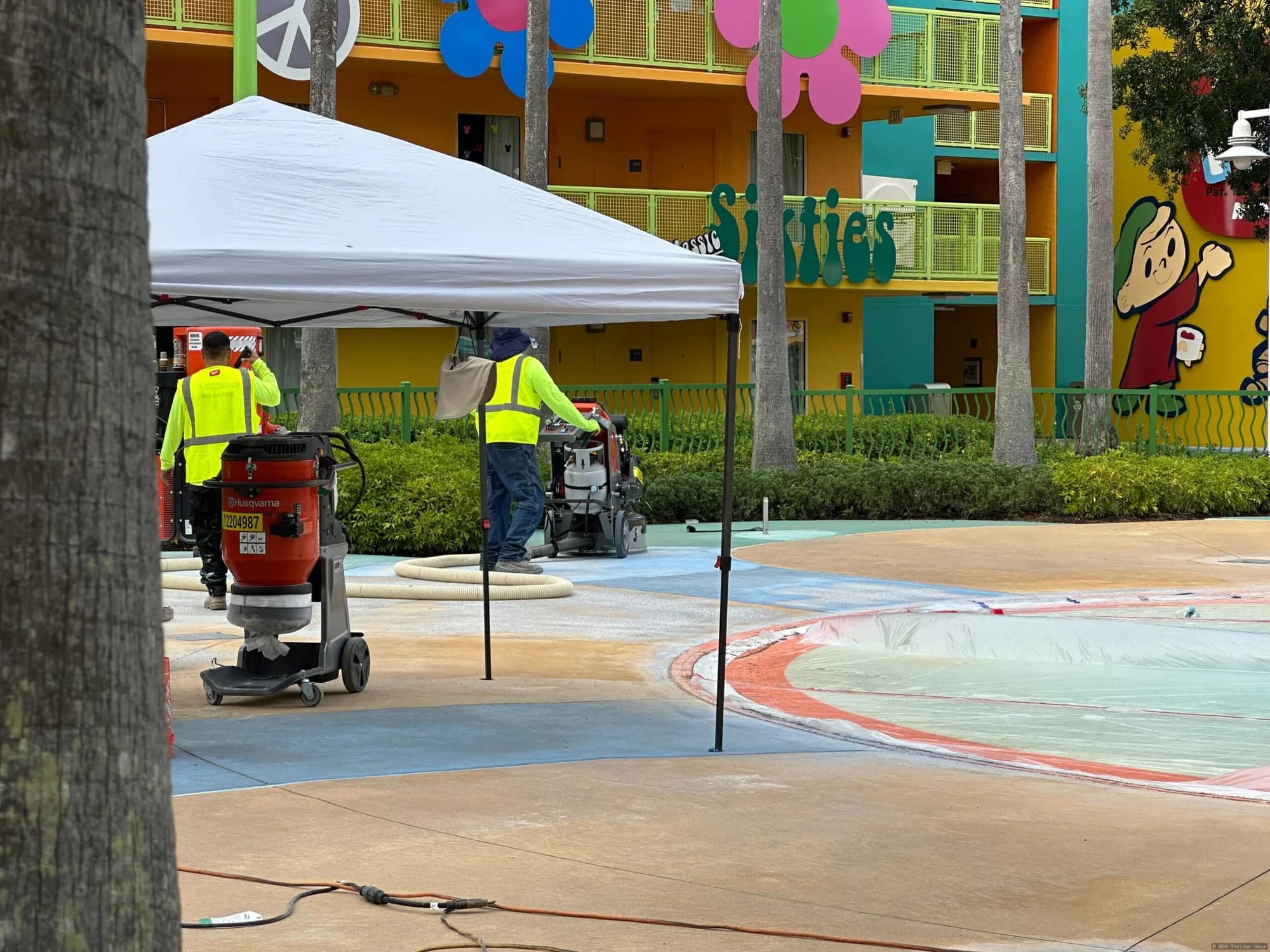 Fenced-off kiddie pool area at Disney's Pop Century Resort undergoing refurbishment works