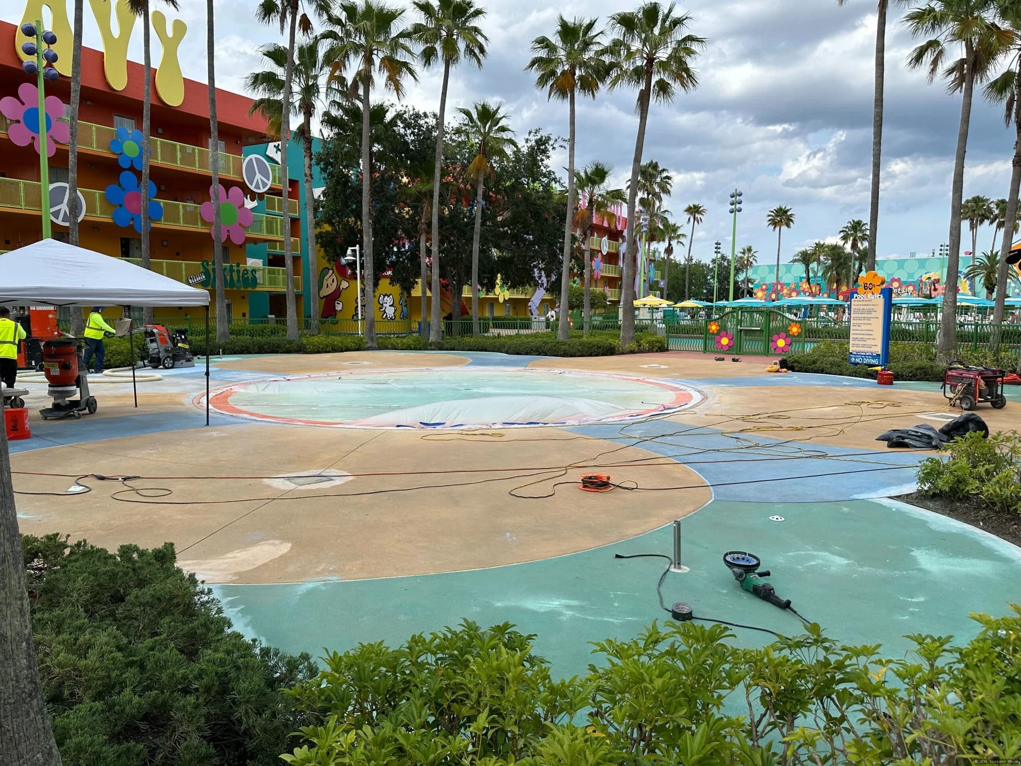 Fenced-off kiddie pool area at Disney's Pop Century Resort undergoing refurbishment works
