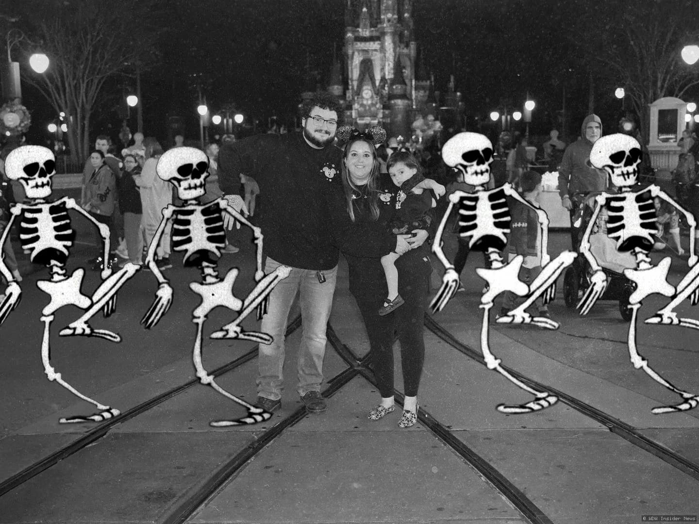 A Halloween-themed Magic Shot display featuring spooky decorations and Mickey Mouse characters at Magic Kingdom's…